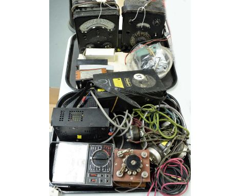 A collection of vintage meters, headphones and cabling, on two trays including: a Tinsley &amp; Co high sensitivety variable 