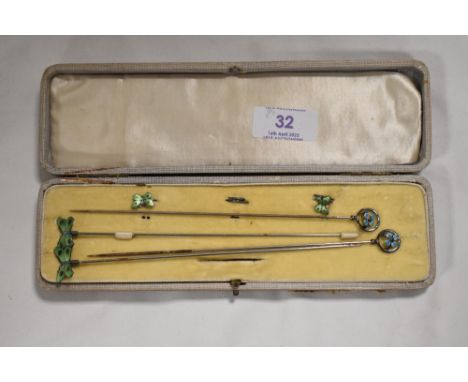 Four Victorian HM silver and enamel hat pins including two butterfly design marked JA&amp;S with two similar butterfly ties, 