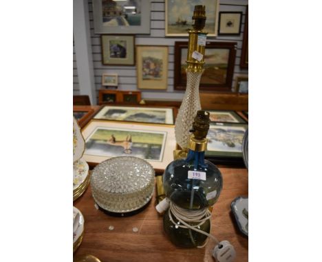 A vintage hour glass form glass lamp base with a brass and cut class lamp base and a pressed glass ceiling light.