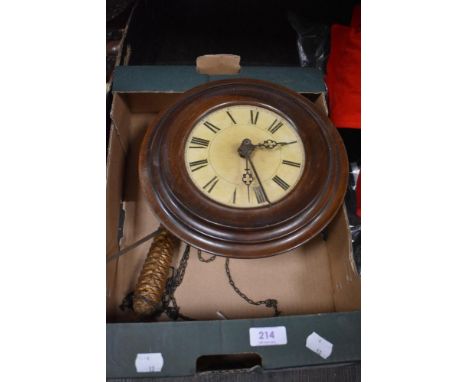 An early 20th century circular framed wall clock.