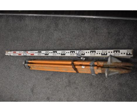 A Hilger Watts Halden surveyors levelling instrument&nbsp;with tripod stand and measure stick.