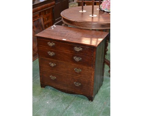 A George III mahogany commode as a four drawer chest