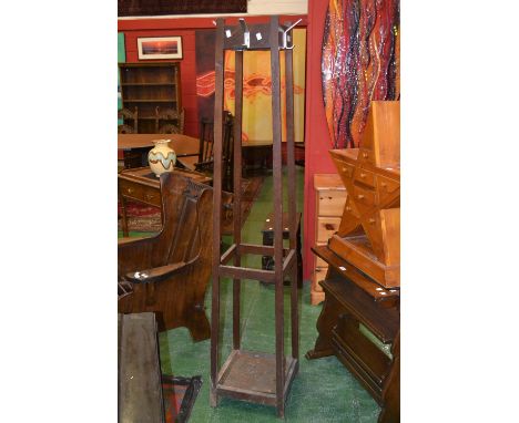 A retro hat stand of spreading square form
