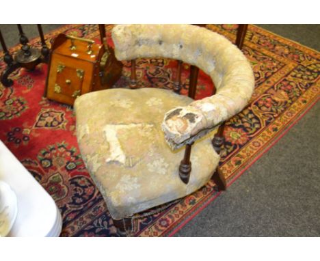 A Victorian spindle back tub chair, button upholstered, rail, serpentine stuffed over seat, turned forelegs, ceramic casters.