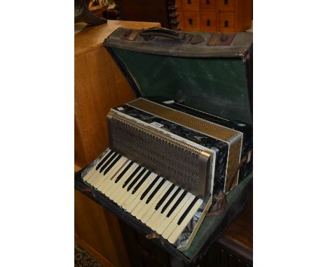 An Estrella 20 icey blue marbelised piano accordion, cased