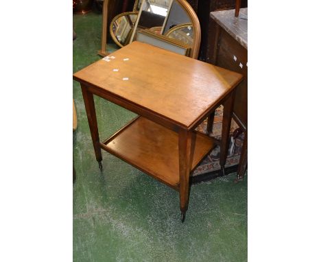 A swivel top card table. 