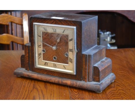 An Art Deco oak mantel clock, three train movement, c.1935