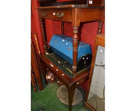 A Victorian pine side table, two short drawers to frieze, turned supports, ceramic castors; a leather inlaid side table, tape