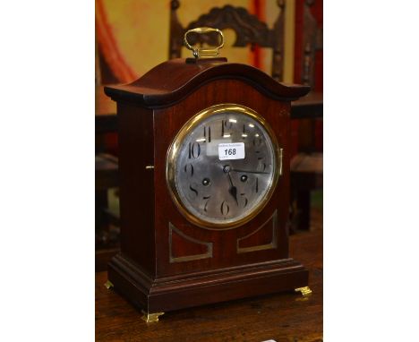 A late Victorian Junghans ting-tang bracket clock, mahogany case, brass mounts, silvered face, Arabic numerals.