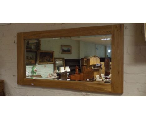 Heavy light oak framed long wall mirror      46" x 24"