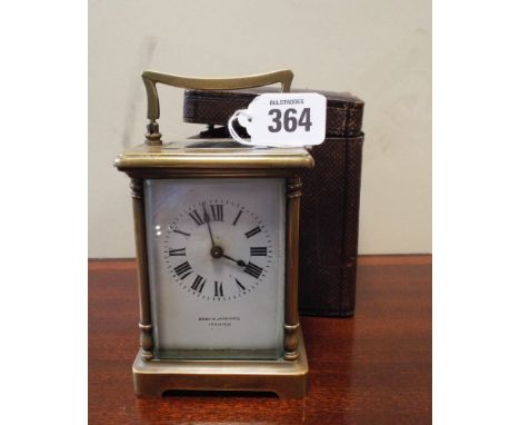 Brass French carriage clock with white enamel dial inscribed Bobby Ann Jannings Ipswich     Glass door at back broken, glass 