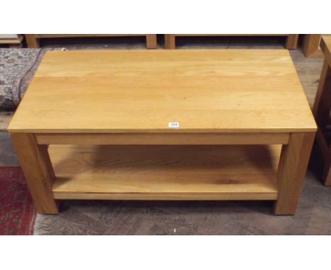 Long heavy light oak coffee table with under tier 