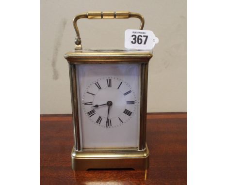 French carriage clock with white enamel dial, height 14cm tall      Serial number of 7002 on backplate, clock does not appear