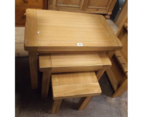 Nest of 2 heavy light oak coffee tables 