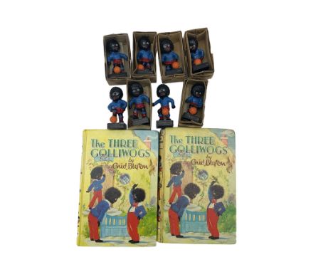 Eight Robertson Jam Golly football figures, H7.5cm, together with two Enid Blyton books (10) These items are listed on the ba