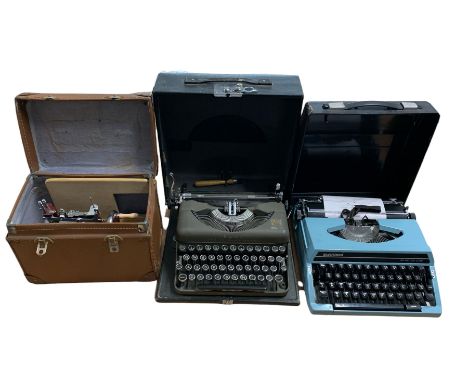 Imperial 'The Good Companion' Model T typewriter, Silver Reed SR 180 De Luxe typewriter and a Children's sewing machine, all 