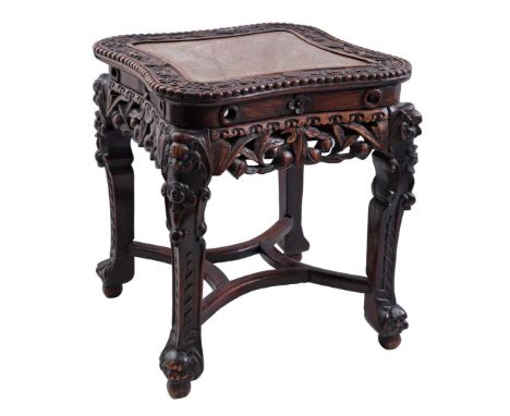 Teak side table with ceramic top and richly carved decor, Asia 20th century, 46 cm high, top 42x42 cm