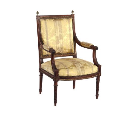 Teak richly upholstered armchair with bronze and copper fittings and classic upholstery, in Louis Seize style