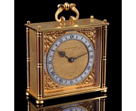 Bucherer Imhof Swiss table clock/travel alarm clock with striking mechanism, case numbered 24 441, 14 cm high