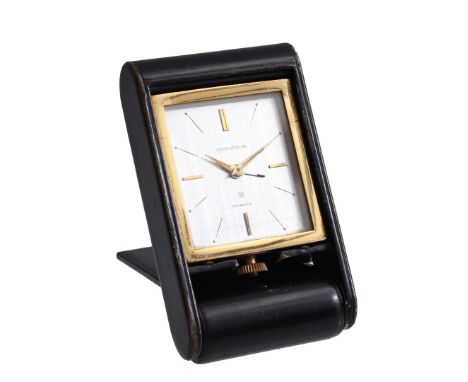 Jaeger LeCoultre Dunhill travel alarm clock in a black leather case, 1960s, movement numbered 113801, 11x6.5 cm