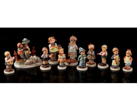 11 porcelain Goebel Hummel statues, largest 11 cm high, 12 cm wide (2 with damage)