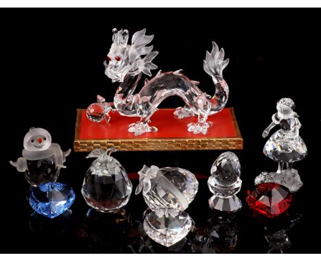 9 Swarovski crystal figures including annual dragon from 1997, Little Red Riding Hood with basket, snowman, heart with bow, p