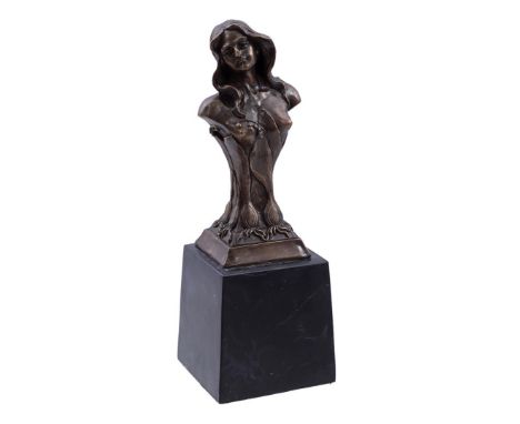 Bronze bust of a woman, on marble base, 29 cm high