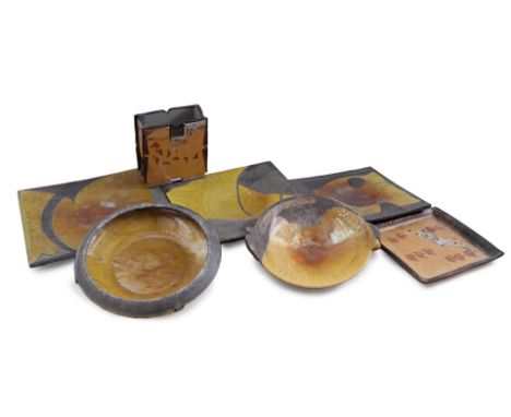 6 Raku ceramic yellow glazed bowls and 1 vase, marked among others, largest bowl 36x36 cm