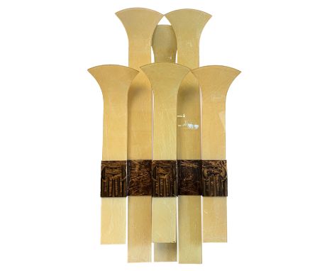 Wall lamp with 6 colored elongated glass plates ending in a curved oncoming top, supported by a gold and bronze colored metal
