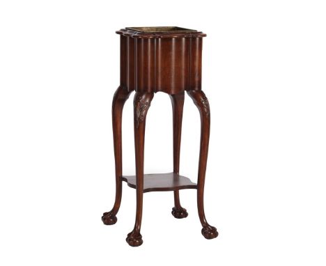 Walnut veneer plant stand with copper inner container, bottom shelf and standing on claw feet