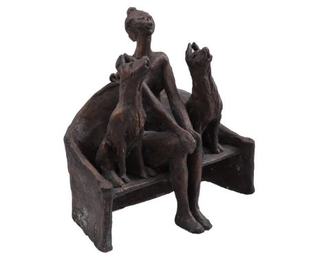 Unclear monogram, bronze sculpture group of a seated woman with 2 dogs on the couch, 20 cm high, 19 cm wide