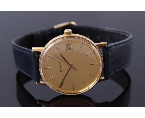 Eterna Swiss men's wristwatch in a gold-colored case, hand wound, case size is 34 mm on a leather strap