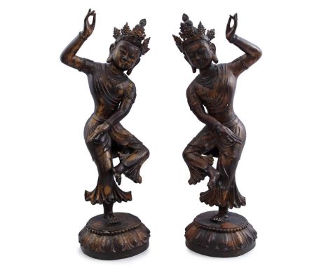 2 gold-colored bronze statues in dancing position, marked on the base, China 20th century, 82 cm high