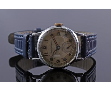 Jaeger LeCoultre men's wristwatch, hand wound, in a steel case, case numbered B 288312, case size is 31 mm on a leather strap