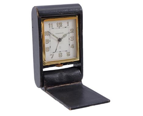 Jaeger LeCoultre travel alarm clock in a leather case, 1950s, 11.5x6.5