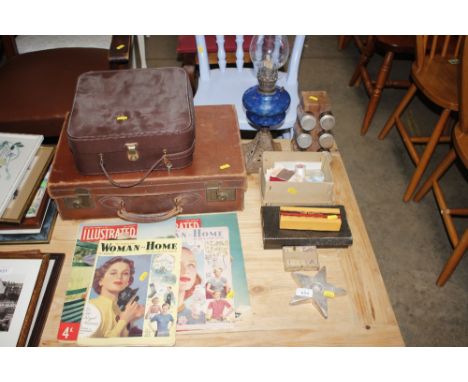 A quantity of sewing items, "Woman and Home" magazine; vintage leather case; oil lamp; spice rack etc
