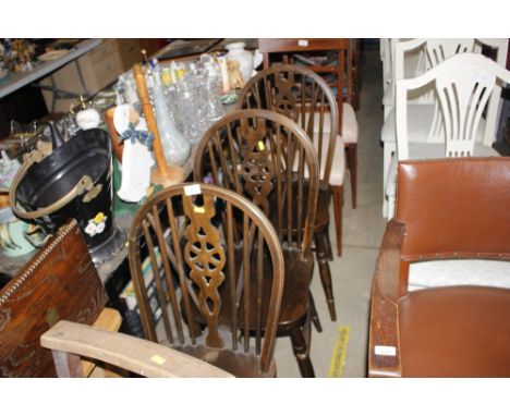 Three stick and wheel back chairs