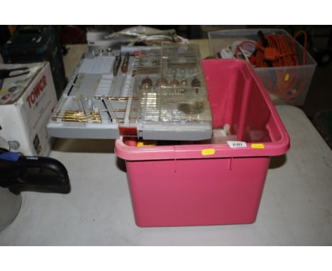 A box of various drill bits, fittings, welding rods etc.