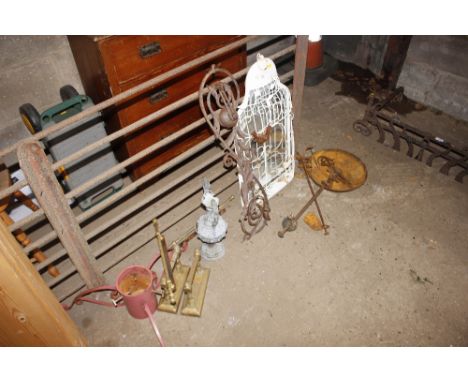 A pair of brass fire dogs; Christmas tree holder; mirrored back candle lantern; balance scales etc.