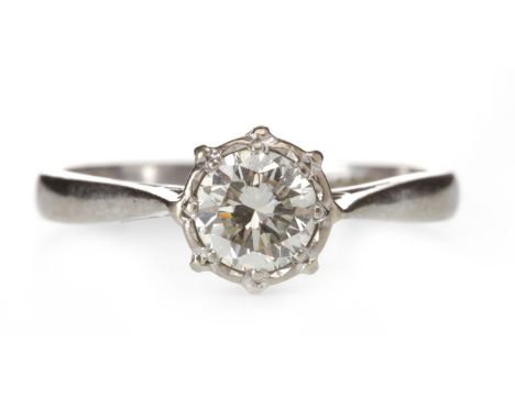 DIAMOND SOLITAIRE RINGwith an illusion set round brilliant cut diamond of approximately 0.50 carats, marked 18CT, size M, 3g