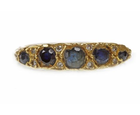 VICTORIAN STYLE GEM AND DIAMOND RINGthe boat shaped bezel set with five graduated dark gems interspaced by pairs of diamonds,