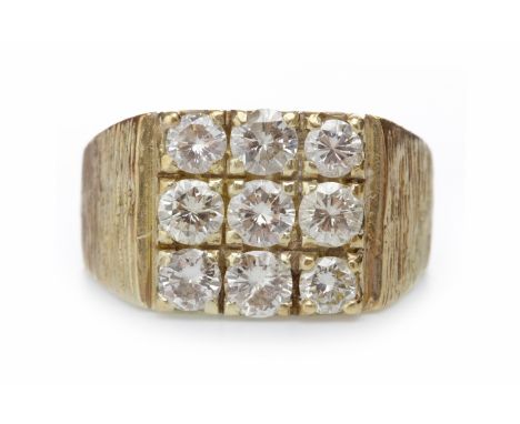 GENTLEMAN'S DIAMOND SET RINGthe square bezel set with round brilliant cut diamonds totalling approximately 0.80 carats, unmar