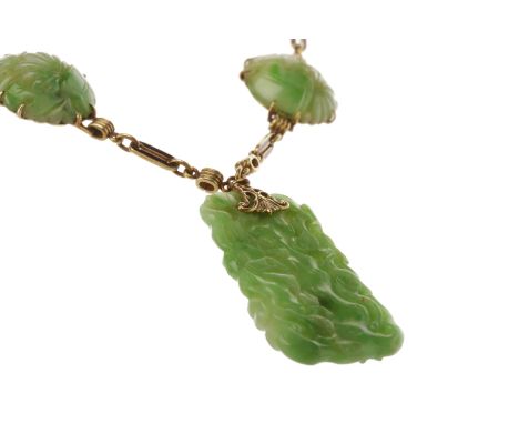 IMPRESSIVE CERTIFICATED EARLY TO MID TWENTIETH CENTURY JADE NECKLETformed by sections of black enamelled fancy link chain and