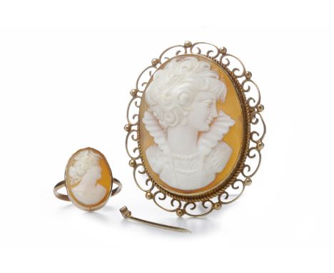 LATE TWENTIETH CENTURY CAMEO BROOCHset with an oval shell cameo carved to depict a female in profile wearing Elizabethan cost