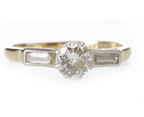 ART DECO DIAMOND SOLITAIRE RINGset with a central round brilliant cut diamond of approximately 0.62 carats flanked by two bag