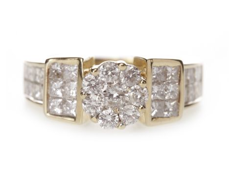 DIAMOND CLUSTER RINGwith a diamond daisy motif cluster bezel set with round brilliant diamonds, on princess cut diamond shoul