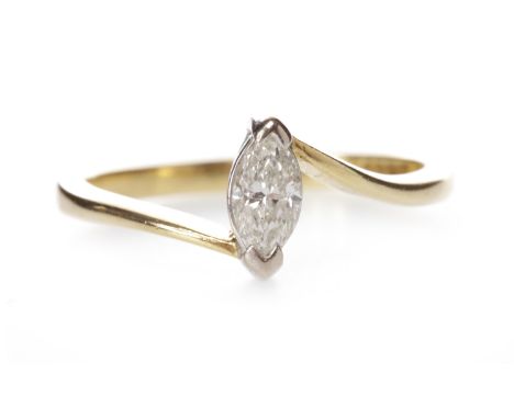 EIGHTEEN CARAT GOLD DIAMOND MARQUISE RINGset with a stone of approximately 0.30 carats, on twist shoulders, size L-M, 2.6g