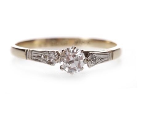 NINE CARAT GOLD DIAMOND SOLITAIRE RINGset with a round brilliant cut diamond of approximately 0.20 carats, one shoulder set w