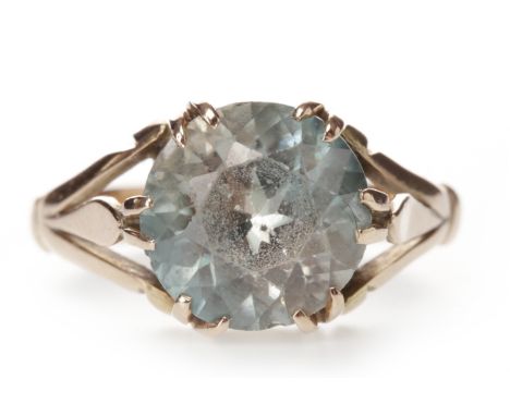 NINE CARAT GOLD ZIRCON SET RINGset with a faceted blue to white zircon 10mm diameter, on trifurcated shoulders, size K, marke