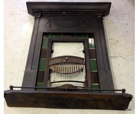 A Cast iron fireplace with surround